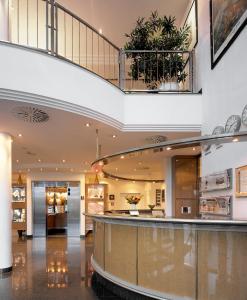 Kuchyň nebo kuchyňský kout v ubytování Sachsenpark-Hotel
