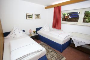 Posteľ alebo postele v izbe v ubytovaní Hotel Irmchen