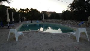 The swimming pool at or close to Agriturismo Al Casale