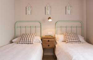 Cama o camas de una habitación en Senda del Cabrerizo