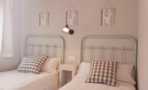 Cama o camas de una habitación en Senda del Cabrerizo