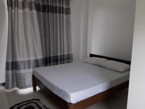 Postel nebo postele na pokoji v ubytování Kanora lake resort