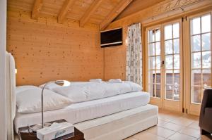 TV a/nebo společenská místnost v ubytování Apartment Bärgrose - GRIWA RENT AG + 30 fotografií