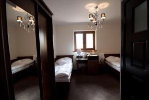 Postel nebo postele na pokoji v ubytování Noclegi Nad Osławą