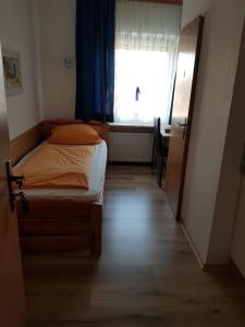 Ein Bett oder Betten in einem Zimmer der Unterkunft Pension Pritzl