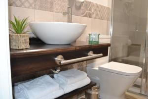 Koupelna v ubytování Hotel Español + 31 fotografií