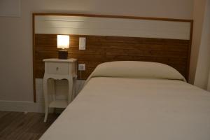 Postel nebo postele na pokoji v ubytování Hotel Español