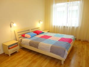 Säng eller sängar i ett rum på Old Riga Town Hall apartment