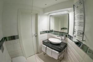 Ванная комната в NovaWisła Resort & SPA