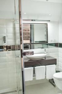 Ванная комната в NovaWisła Resort & SPA