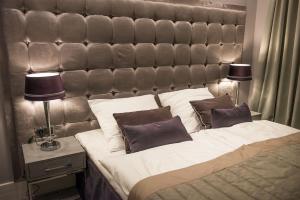Кровать или кровати в номере NovaWisła Resort & SPA