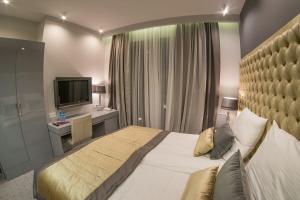 Кровать или кровати в номере NovaWisła Resort & SPA