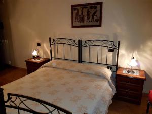 Postel nebo postele na pokoji v ubytování Hotel Scalinatella