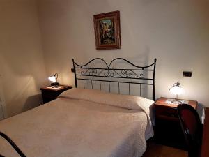 Postel nebo postele na pokoji v ubytování Hotel Scalinatella