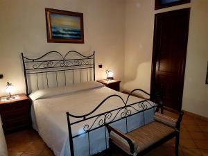 Postel nebo postele na pokoji v ubytování Hotel Scalinatella