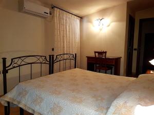 Postel nebo postele na pokoji v ubytování Hotel Scalinatella