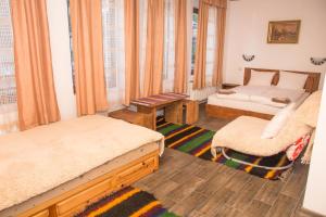 Tempat tidur dalam kamar di Villa Zaburdo