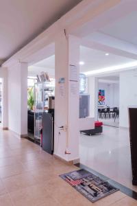 Kuchyň nebo kuchyňský kout v ubytování Hotel Quinta Avenida