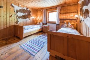 מיטה או מיטות בחדר ב-Almliesl RAUR-437