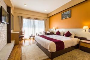 Letto o letti in una camera di Hotel Queens Park