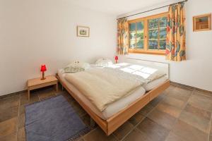 Postel nebo postele na pokoji v ubytování Försterli Ost