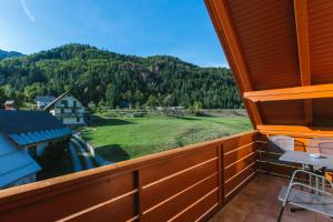 a balcony with a view of a mountain at Apartments Dominika in Bohinjska Bela