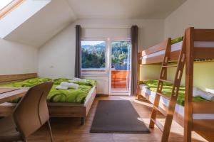 Ένα ή περισσότερα κρεβάτια σε δωμάτιο στο Apartments Dominika