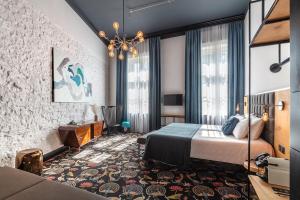 Postel nebo postele na pokoji v ubytování Hotel Rum Budapest