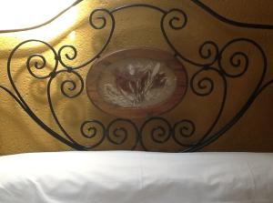 Postel nebo postele na pokoji v ubytování Hotel Posada San Antonio
