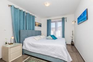Postel nebo postele na pokoji v ubytování Villa Lurda Linardici Krk + 24 fotografií