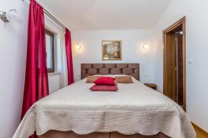 Postel nebo postele na pokoji v ubytování Villa Lurda Linardici Krk