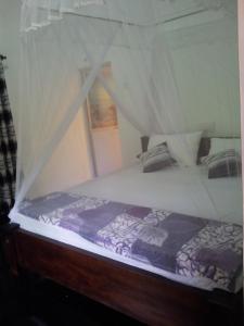 Ένα ή περισσότερα κρεβάτια σε δωμάτιο στο Ami place Rooms with Kitchen
