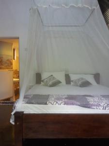 Ένα ή περισσότερα κρεβάτια σε δωμάτιο στο Ami place Rooms with Kitchen