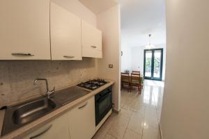 A kitchen or kitchenette at ARIES Case Vacanza