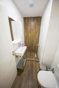 a bathroom with a toilet and a sink at Greenland Premium Residance in North Nicosia +15 photos