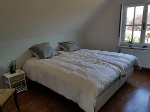 Postel nebo postele na pokoji v ubytování De Goeferdij vakantiewoning