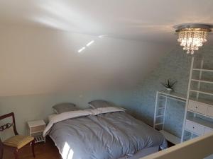 Postel nebo postele na pokoji v ubytování De Goeferdij vakantiewoning