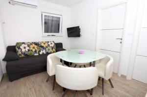 Posezení v ubytování Apartments Dora