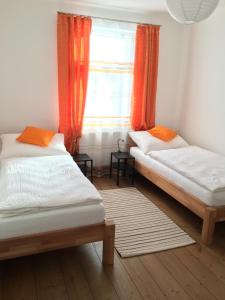 Łóżko lub łóżka w pokoju w obiekcie Ferienhaus Karoline