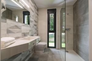 Koupelna v ubytování Hotel A Curuxa Wellness