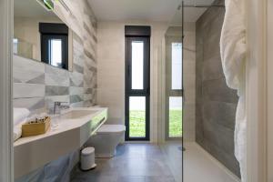 Koupelna v ubytování Hotel A Curuxa Wellness