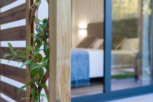 Postel nebo postele na pokoji v ubytování Hotel A Curuxa Wellness