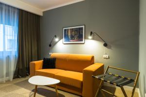 Posezení v ubytování UpperHouse Suites & More