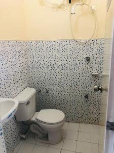 Koupelna v ubytování Edem Tourist Inn Malapascua