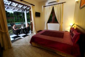 Postel nebo postele na pokoji v ubytování Villa Velmarie Yoga and Ayurveda house all inclusive