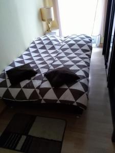 Кровать или кровати в номере Wohnung in Wien