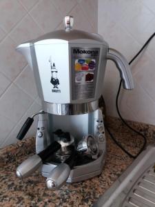 a coffee maker sitting on top of a counter at Casa Giulia in Cagliari