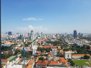 Nespecifikovaný výhled na destinaci Phnompenh nebo výhled na město při pohledu z hotelu