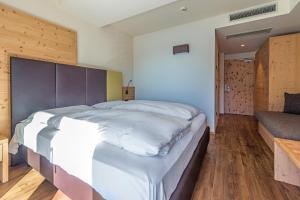 Postel nebo postele na pokoji v ubytování Hotel Fontanella