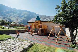 Otroško igrišče poleg nastanitve Green Sheep Boutique Hotel